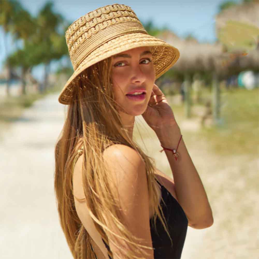 FancyBraidStrawSummerCloche-CappelliStraworldHatswomenwearinghatonbeach.jpg