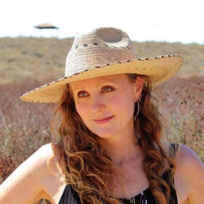 LargeShapeableBrimWovenPalmSunHat-JSAmodelwearingpalmsunhat.jpg
