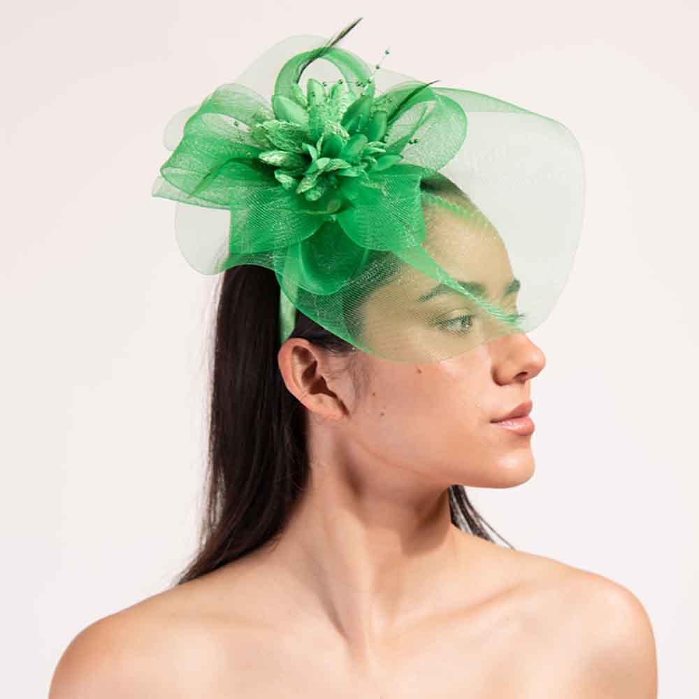 SilkFlowerCenterTulleFascinator-SomethingSpecialgreenonmodel.jpg