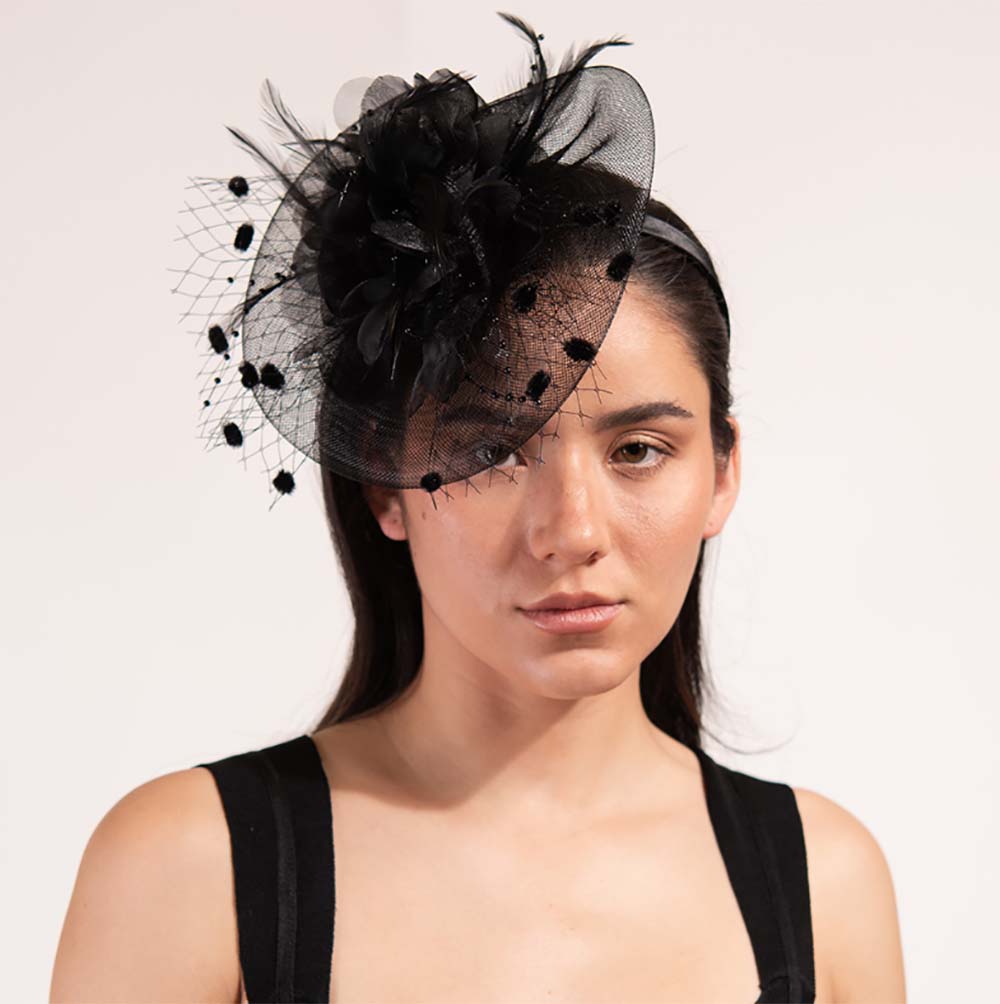 SilkFlowerandDottedNettingFascinator-SomethingSpecialonmodel.jpg