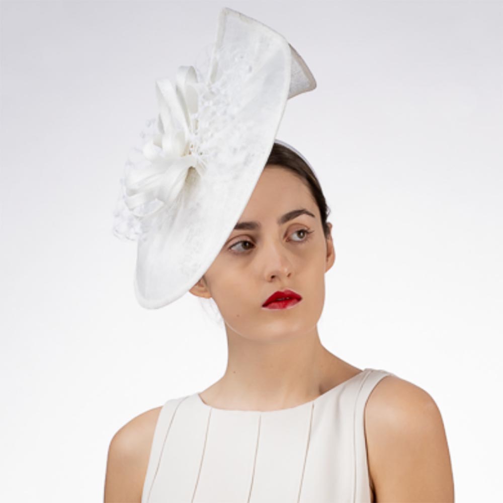 WavySinamayDiskCocktailHat-KaKyCOwomenwearingwhitefascinator.jpg
