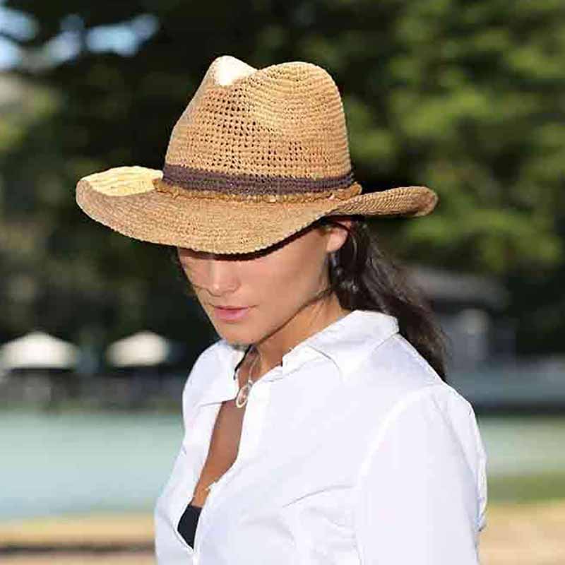 tahiticowboyhatbywallaroomodelwearingraffiacowboyhat.jpg