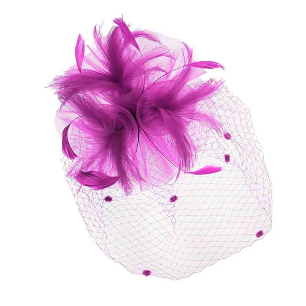 triplelilliesfeatherburstcenterfascinatorfuchsiasomethingspecialhats.jpg